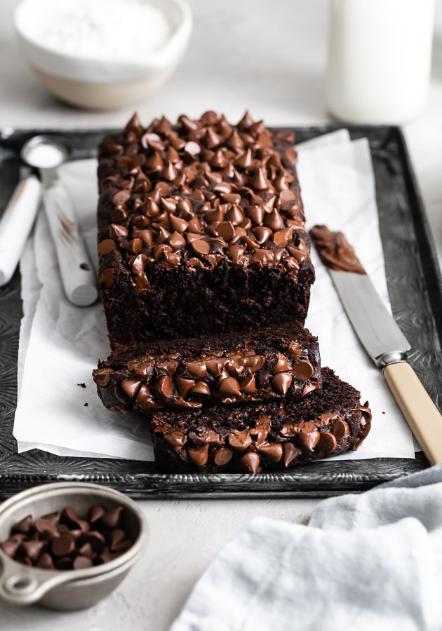 slices of double chocolate banana bread topped with melty chocolate chips