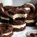 rows of brownie cookie sandwiches with cookie dough buttercream